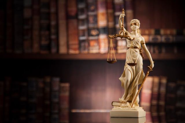 Law and justice concept, Brown wooden background, beautiful reflections